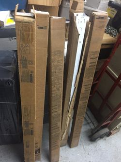 5 T-12 4’ fluorescent light fixtures