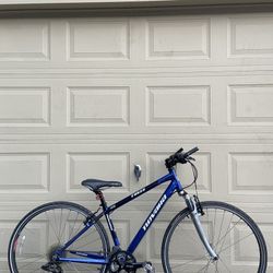 Novara Forza Hybrid Bicycle – 14” Small Frame – 700c – 24 Speed – Bike