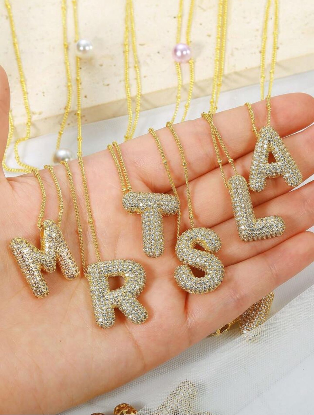 M pendant necklace