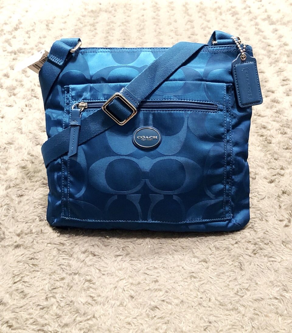 Rare Coach Getaway crossbody paid $128 New! Brand new with tags. “Extremely Rare Color” Coach Getaway Signature Mineral Nylon Cross Body Bag. #F77408