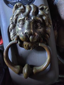 Solid brass lion door knocker