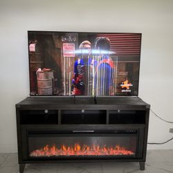 75” Samsung Smart Tv With Fire Place/tv Stand