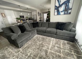 Gray sectional with ottoman