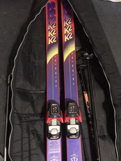 Salomon skis with bearings and ski poles