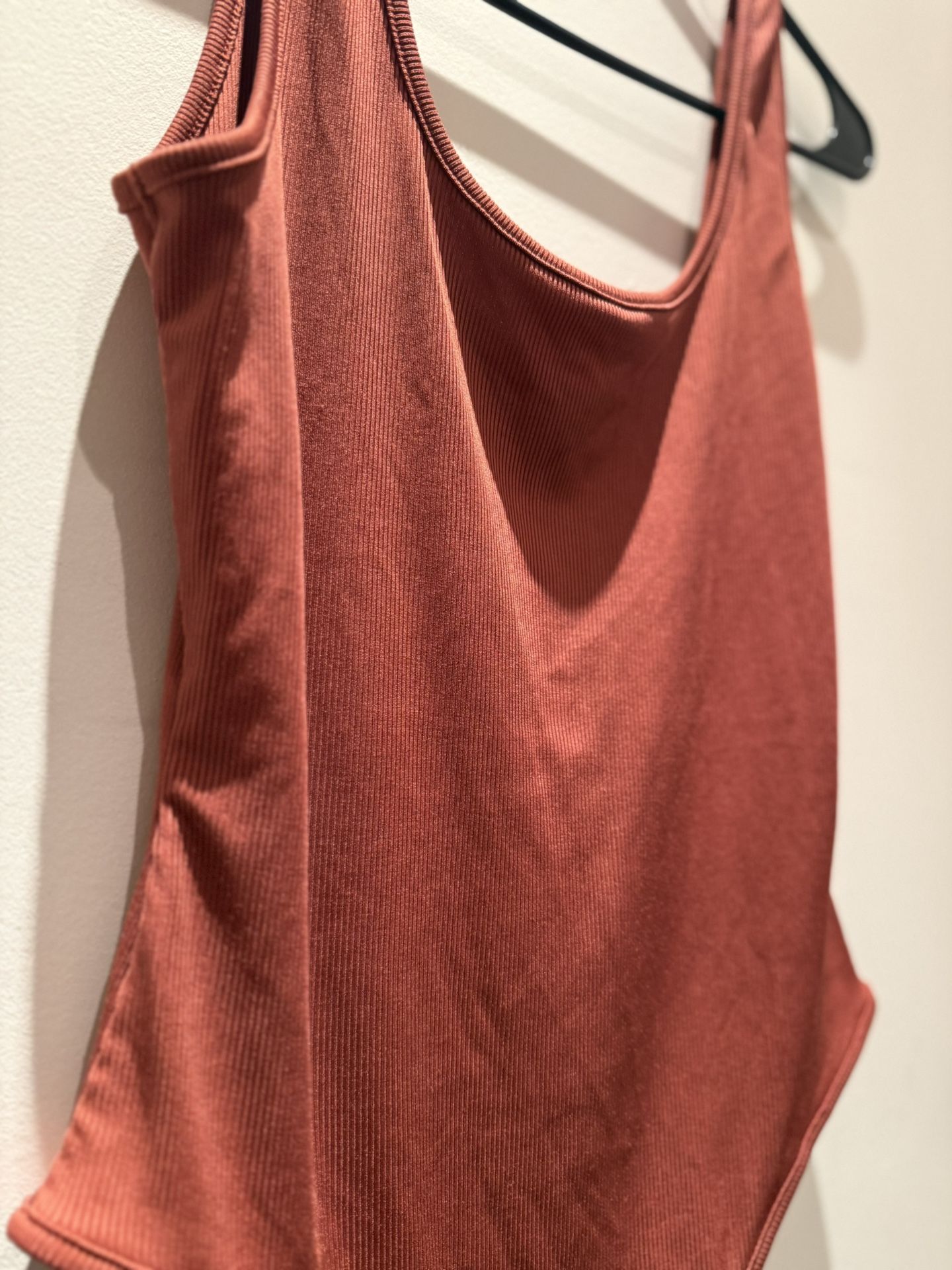 3 Ribbed Woman’s Body Suit In Rustic Orange, White, & Black