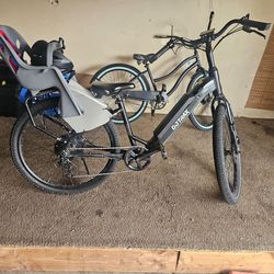 Send offers or trade/ GOTRAX Adult Transit 27.5" Electric Hybrid Bike comes with charger and child seat
