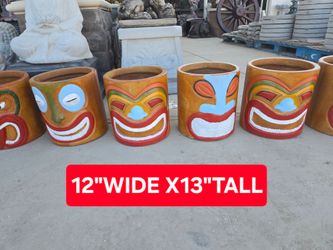 CONCRETE TIKI PLANTERS $85 EACH