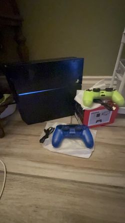 "Sony PlayStation 4 Console + 2 Controllers Bundle",