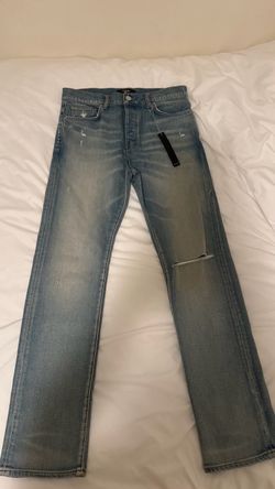 Amiri Distressed Light Wash Jeans