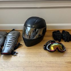 Motorcycle helmet, gloves, goggles, knee pads