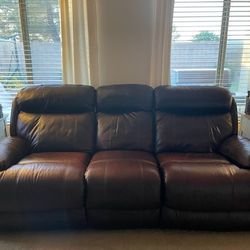 Leather/Electric Reclining Sofa And Love Seat