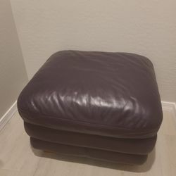 2 Leather Ottomans 