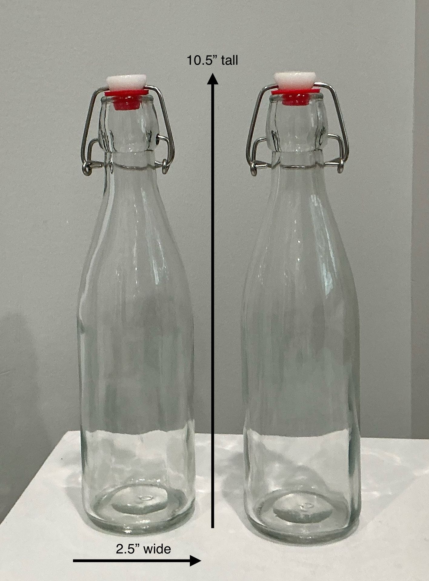 Pair of Thick Clear Glass Bottles with Attached EZ Cap Corks