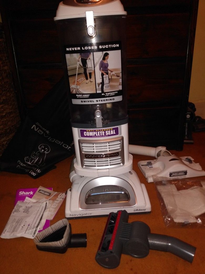 Like New 2 SHARK Vacuums Lift Away Pro, With Everything Included.