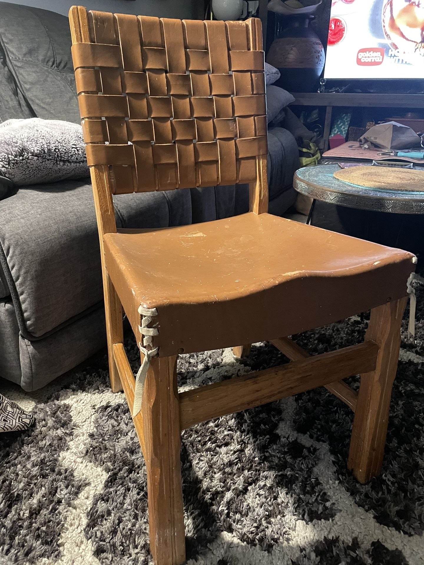 unique and hard to find Brandt Ranch Oak  leather /wooden hand made chair 🪑 very heavy very solidly built has off white leather tassels on the left a