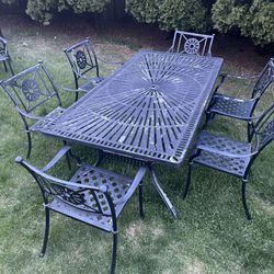 solid cast aluminum patio set 1 table 84x42 and 6 chair $570 OBO