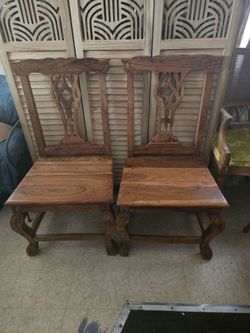 Four Carved Solid Wood Dining Chairs