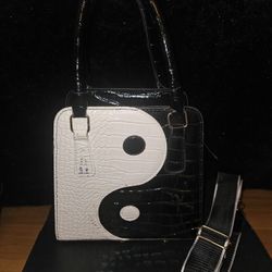 Chic Black & white faux leather yin yang crossbody bag with adjustable shoulder strap. Croc-embossed Texture.