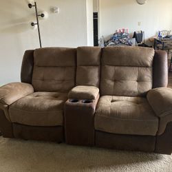 Recliner couch, armrest storage, cupholders, charging ports