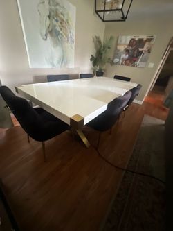8 ft solid white table with 6 chairs