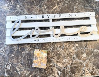 Sign Holds Pictures