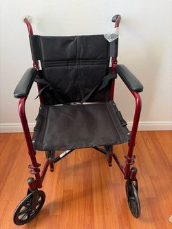 Transport wheelchair