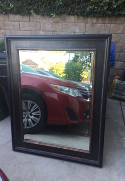 Large mirror beveled. 40”x51” Dark Color