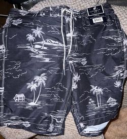 New. Mens size large swim shorts