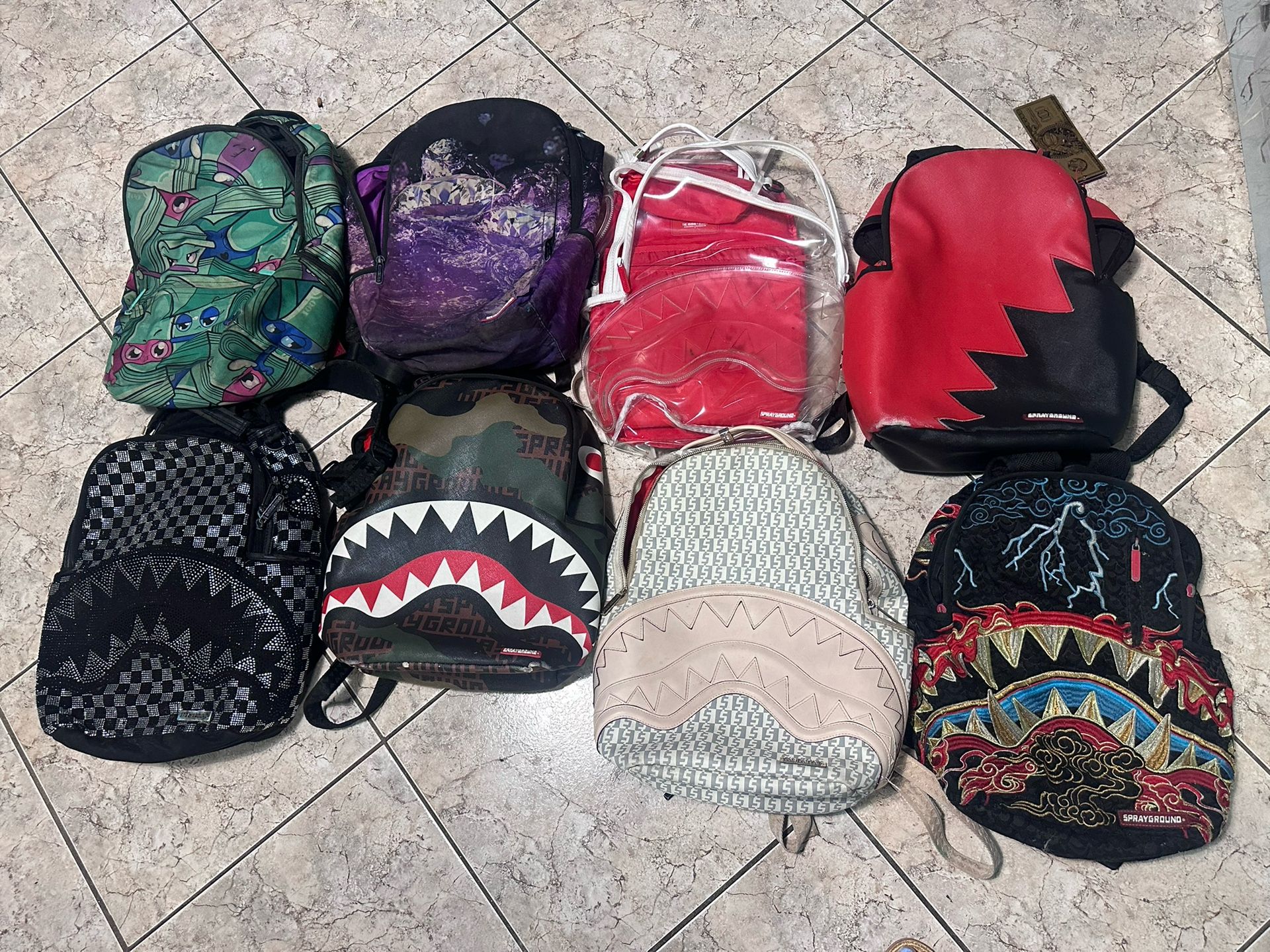 SPRAYGROUND USED LOT