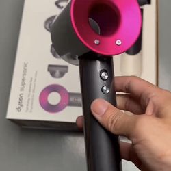 Pink Dyson supersonic hairdryer