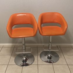 2 orange stools 