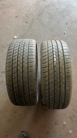 Two 235/30/22 tires