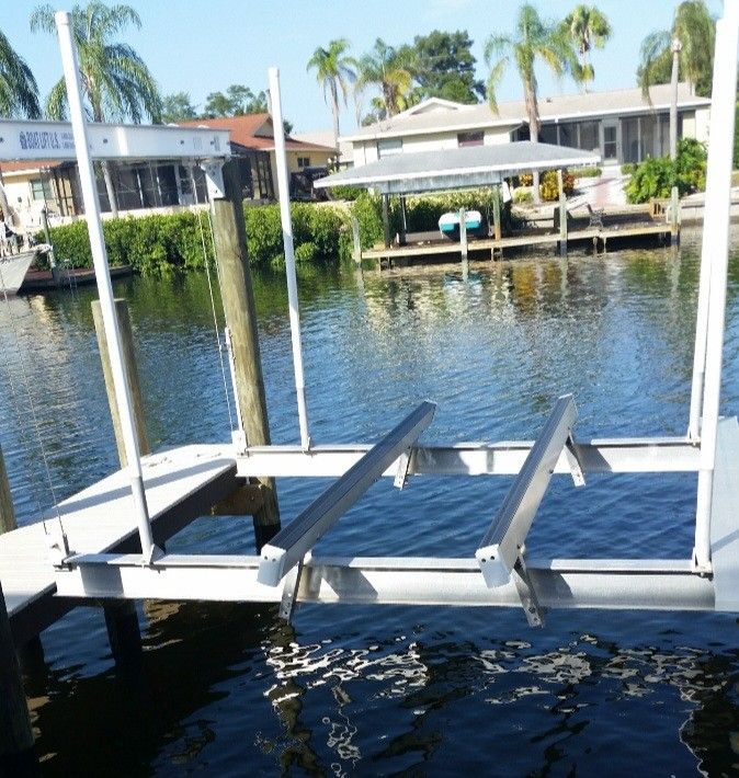 Boat Lift US 13k lbs, 4 Pole Cradle lift with Aluminum Bunks. Direct drive stainless steel motors