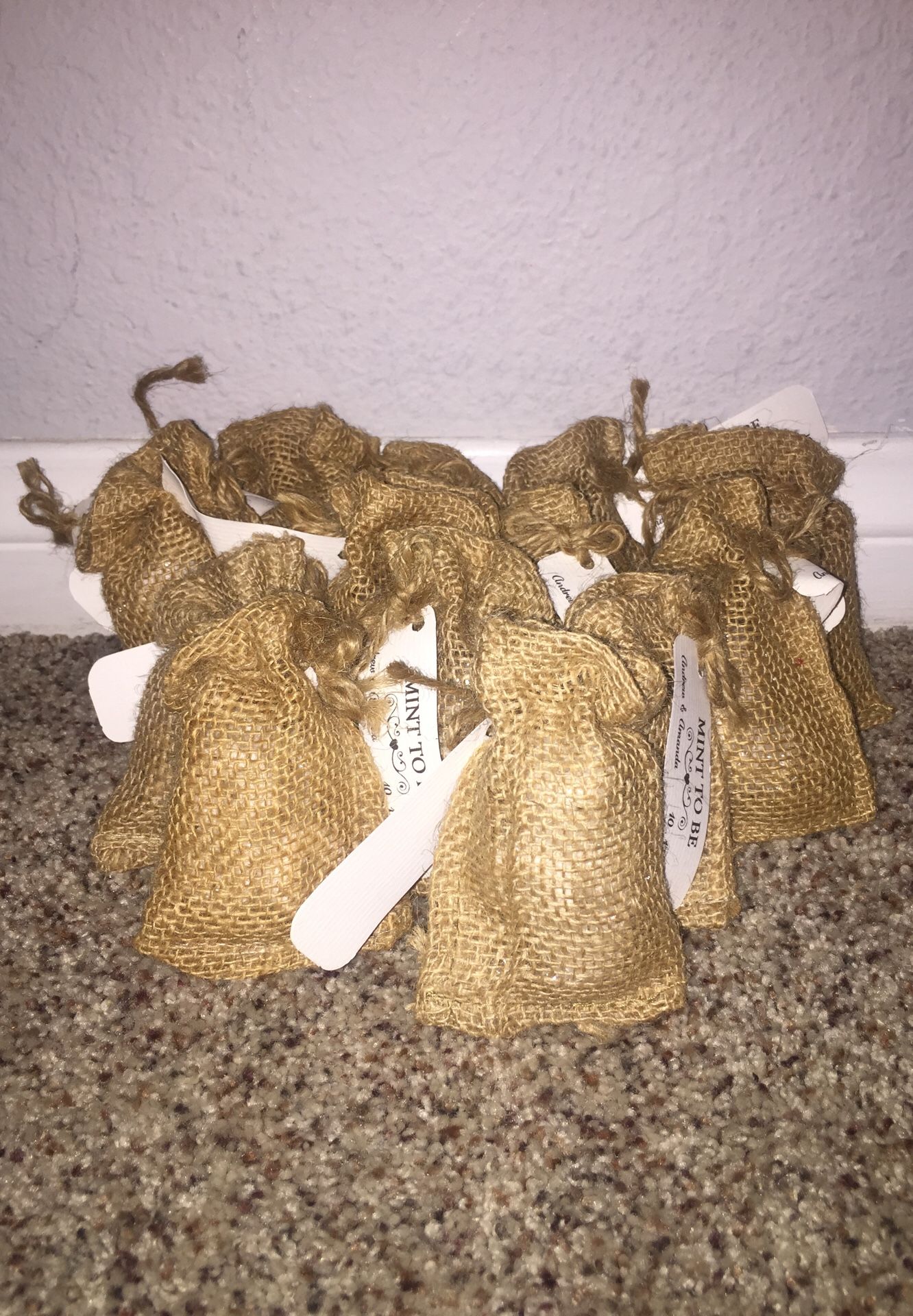 Mini burlap bags filled with mints. (14) Mint to be party favors