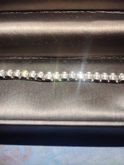 Lab diamond 3 ct and sterling silver for $450...great deal because I paid around $1500 for it