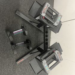 Brand new adjustable weighted dumbbells