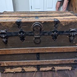 Antique Steamer Trunk With Wheels On Bottom  