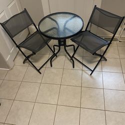 Table and Foldable Chairs