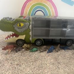 DINOSAUR TRANSPORT TRUCK! 4 SOUND BUTTONS!!  HOLDS 12 Small DINOSAURS !  9 Mini dinosaurs included 
