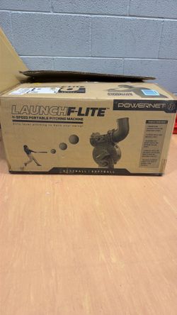 Baseball and softball pitching machine