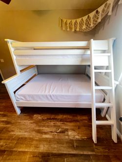 White bunk bed with ladder