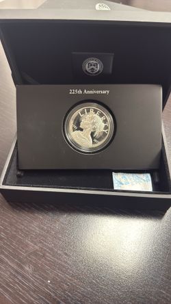 The American Liberty 225 th Anniversary Silver Medal is minted in 99.9% silver with a proof finish. Each silver medal is hand packaged in an exquisite