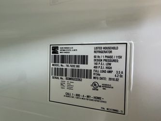 Nice Kenmore white refrigerator freezer on the bottom electric stove