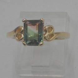 14KT  YELLOW GOLD RING SIZE 6.25 3.6 GRAMS WITH TOURMALINE STONE 7.8 X 6.1 MM. DTONE HAVE INCLUSIONS . 889921-4 .
