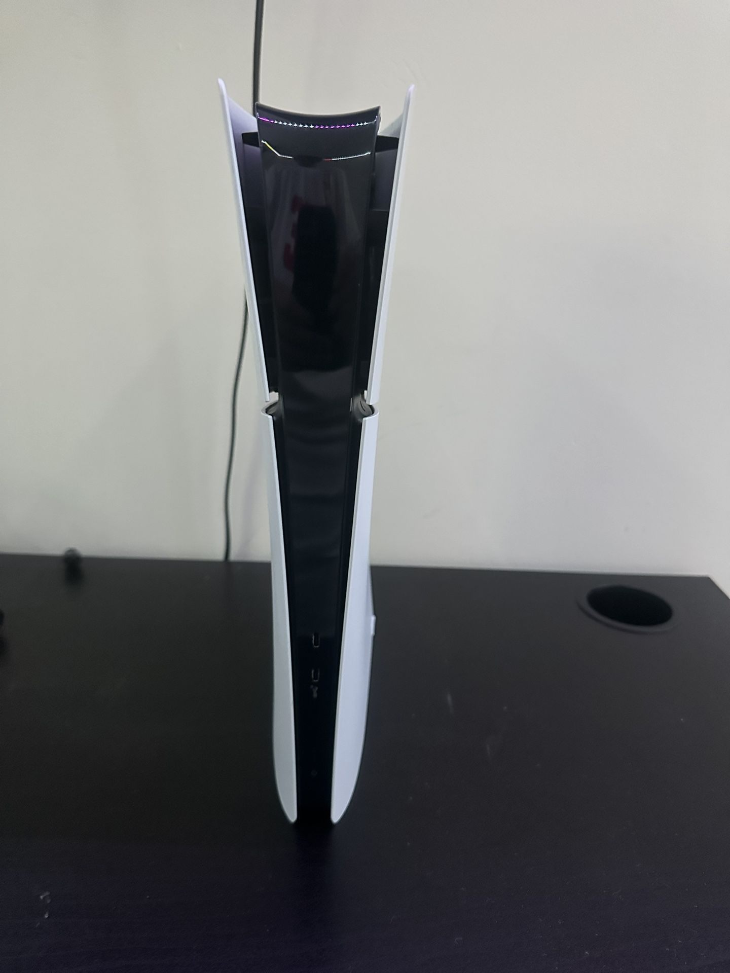 Sony PlayStation 5 Slim Digital Edition with controller, and other accessories