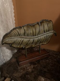 Metal leaf on a stand