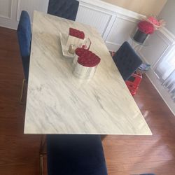 Table And 4 Chairs