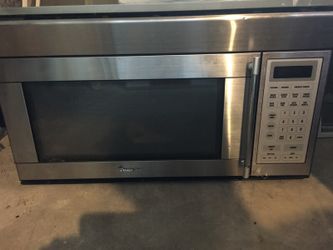 Over the stove microwave. Never used. New condition.