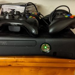 Xbox 360 With 11 Games And 3 Controllers.