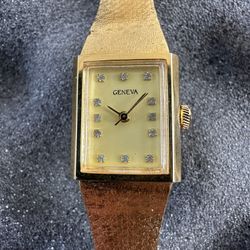 Geneva 14k Gold Lady’s Watch , With 12 Diamonds 